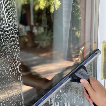 Professional commercial window washing by Holy Cow Window Services.